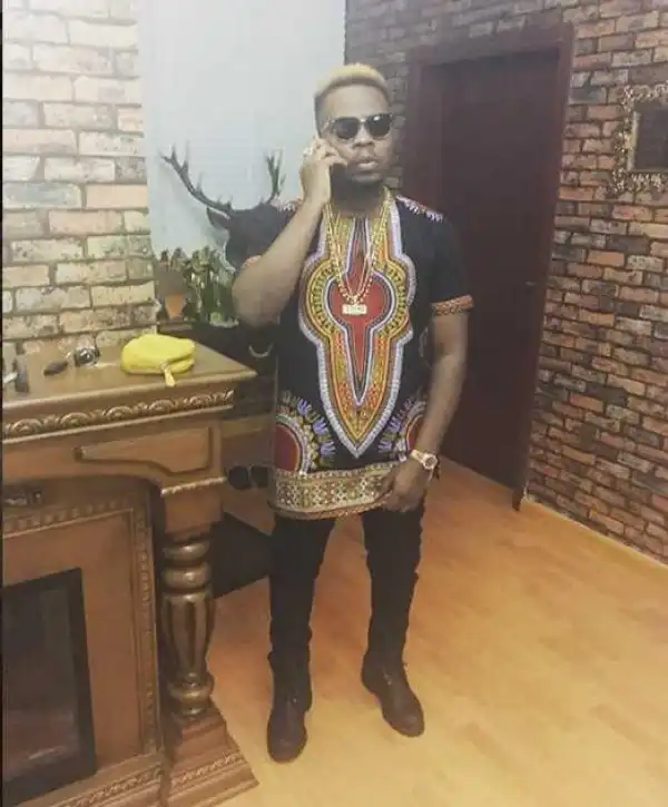 Olamide Looks Sharp In ‘Dashiki’ Outfit & His Custom YBNL Necklace (Photos)